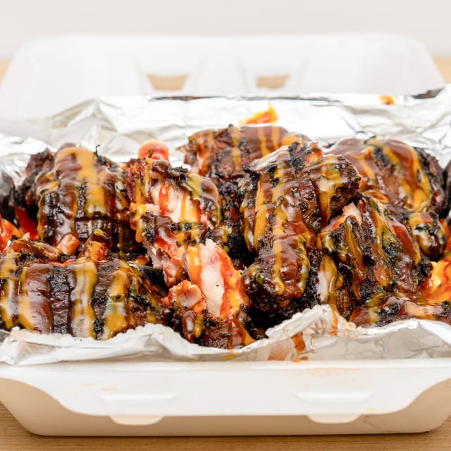 Large Jerk Chicken With Fries.