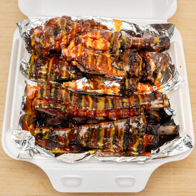 Ribs/Jerk Chicken N Mac ' Cheese N /Beans.